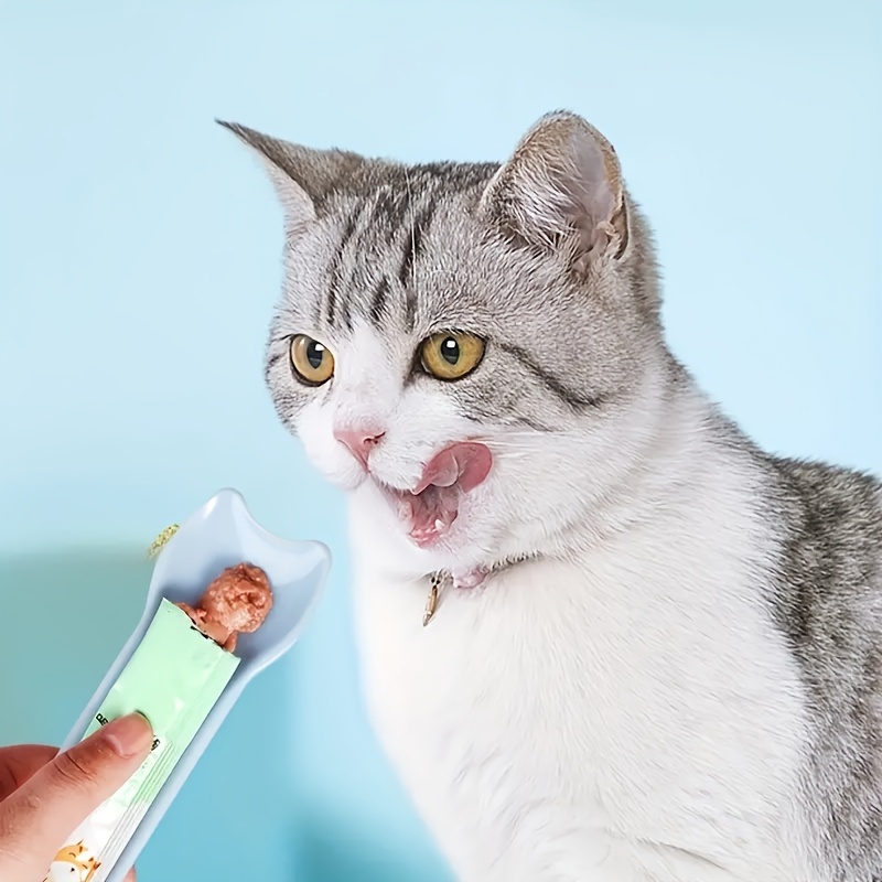 17851376801636673844.jpg Cat Strip Squeeze Spoon - Image 1